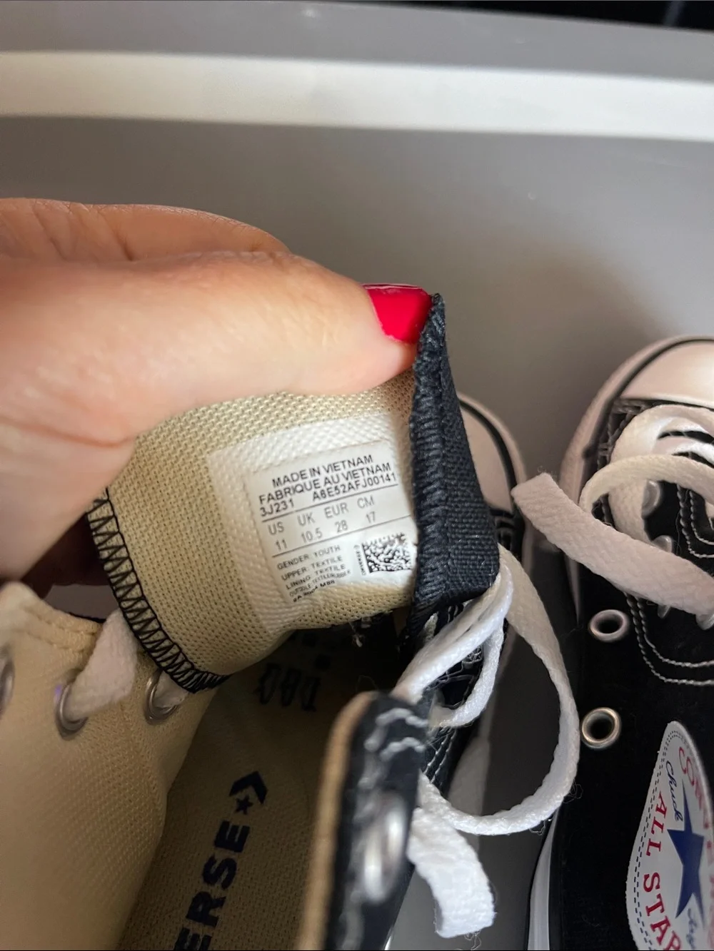 Kids 11 Converse Black and White High-Top Sneakers